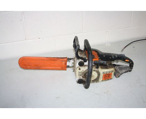 A STIHL O11AV PETROL CHAINSAW  in distressed condition (engine pulls freely but not started)