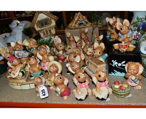 A COLLECTION OF PENDELFIN RABBITS AND STANDS, comprising two Rolly (one with two notes sheet, the other with one note sheet),