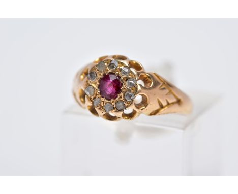 A LATE VICTORIAN 18CT GOLD RUBY AND DIAMOND CLUSTER RING, designed with a central, circular cut ruby within a rose cut diamon