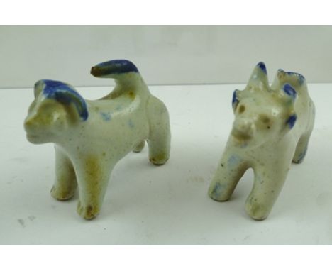 TWO 19TH CENTURY CHINESE GLAZED CERAMIC ANIMAL ORNAMENTS with cobalt blue painted ears and tails, 5cm high 