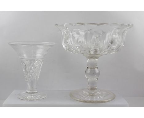 AN EARLY 19TH CENTURY MOULDED AND CUT GLASS TAZZA on knopped stem with platform base, 21cm high, together with a TRUMPET FORM