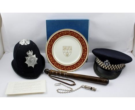 A POLICEMAN'S CAREER COLLECTION, includes his first constables helmet, 'Shropshire Constabulary', his whistle and truncheon, 