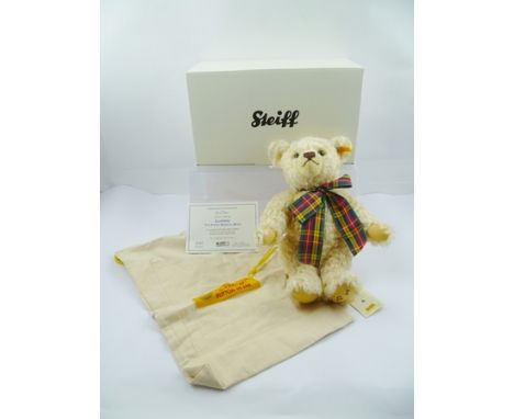 A STEIFF MOHAIR TEDDY BEAR "Ludwig" fitted musical movement, button and yellow tag in ear, with certificate, in vendor's card