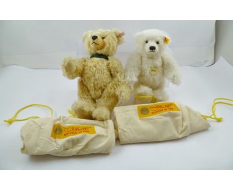 TWO STEIFF MOHAIR TEDDY BEARS, one with button and white ear tag, he also has a brass medallion on a green ribbon about his n