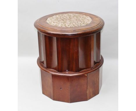 A LATE VICTORIAN MAHOGANY COLUMN FORM COMMODE with fabric inset hinged cover, fluted stem, complete with ceramic bucket liner