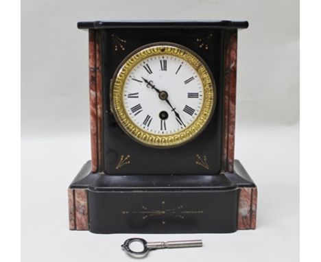 A FRENCH LATE 19TH CENTURY BLACK SLATE MANTEL CLOCK, white enamel dial and Roman numerals, 23cm high 