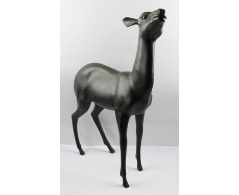 A PATINATED BRONZE STATUE OF A DEER, standing 58cm high 