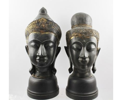 TWO FAR EASTERN BRONZE BUDDHISTIC HEADS, partial gilt crown decoration, possibly Indonesian, tallest 30cm 