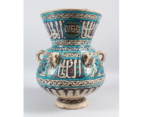 AN 18TH-19TH CENTURY DAMASCUS POTTERY BULBOUS MOSQUE LAMP OF MAMLUK STYLE, with one handle, notch and calligraphy, 36cm high.