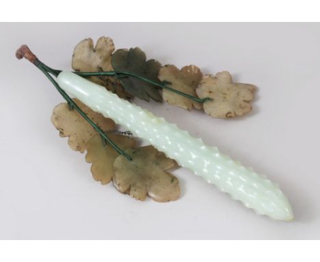 A LATE 19TH CENTURY CHINESE CARVED JADE CUCUMBER &amp; LEAVES, 26.5cm long x approx 13cm wide including leaves.