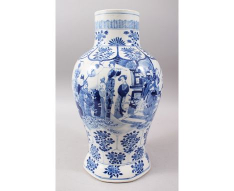 A 19TH CENTURY CHINESE BLUE &amp; WHITE PORCELAIN VASE, the body decorated with scenes of figures stood within landscape sett