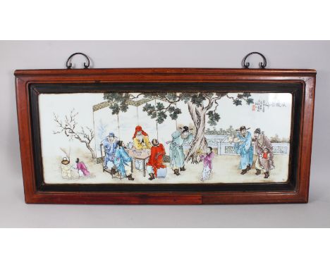 A 20TH CENTURY CHINESE FAMILLE ROSE REPUBLIC STYLE FRAMED PLAQUE, the plaque depicting scenes of eight immortals and one play