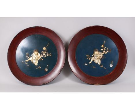 A PAIR OF GOOD JAPANESE MEIJI PERIOD SHIBAYAMA &amp; WOOD CIRCULAR PANELS, both panels distinguished in high relief using car