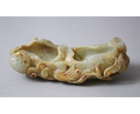 A GOOD 18TH / 19TH CENTURY CHINESE CARVED JADE TWIN BRUSH WASHER,  carved in the form of an open lotus flower, with carved de