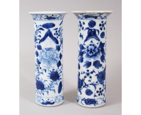A PAIR OF 19TH CENTURY CHINESE BLUE &amp; WHITE PORCELAIN SPILL VASES, the body's with floral decoration, the bases with four