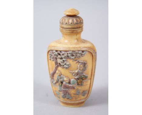 A VERY GOOD 19TH CENTURY CHINESE CARVED IVORY AND POLYCHROMED DECORATION SNUFF BOTTLE, the body of the bottle carved to depic