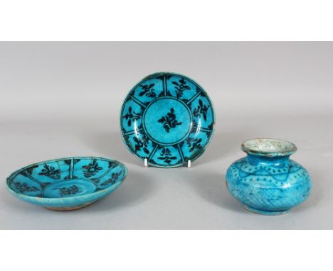 TWO 16TH CENTURY PERSIAN KUBACHI POTTERY SAUCERS and ink pot, saucer 13cm diameter, pot 6cm high. D&amp;S. Howlett Collection