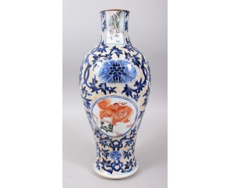 A RARE 19TH CENTURY CHINESE BLUE &amp; WHITE FAMILLE ROSE CRACKLE GLAZE PORCELAIN VASE, with four separate panels of painted 