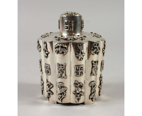 A GOOD CHINESE SOLID SILVER TEA CADDY, with carved and applied decoration in the form of mythical creatures, floral scenes, a