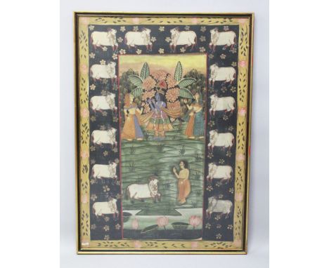 A 19TH-20TH CENTURY FRAMED INDIAN PAINTING ON TEXTILE depicting a blue skin god playing an instrument, beside him two ladies 
