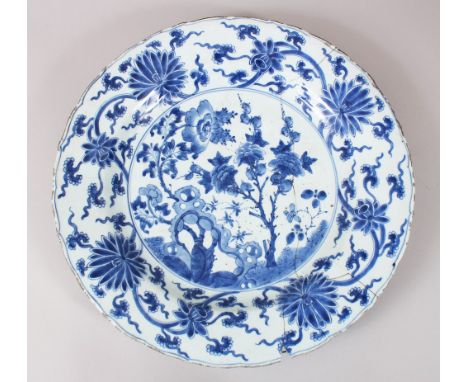 A CHINESE KANGXI BLUE &amp; WHITE CHARGER, with floral decoration, 39cm diameter, (AF)