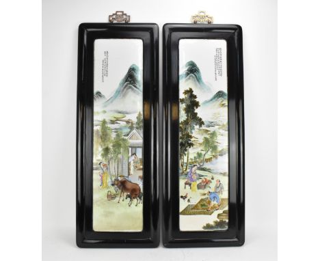 A pair of Chinese Famille Rose porcelain plaques, Republic period, early 20th century, of vertical form, each painted with fa