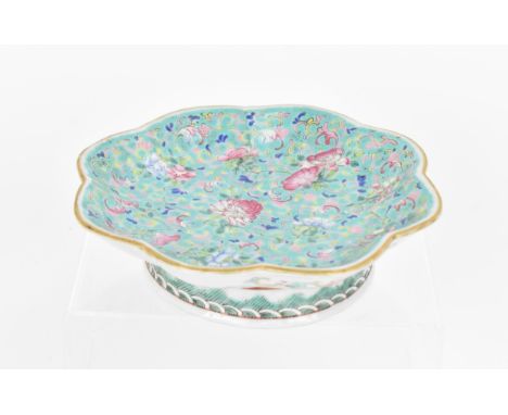 A Chinese porcelain pedestal dish, Tongzhi period, circa 1862-1874, with petal gilt border, turquoise enamel ground decorated