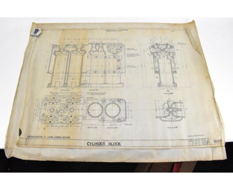 Two early 20th century rolled car engineering drawings, one for Aston Martin, dated 1922, titled 'Cylinder Block', lower left