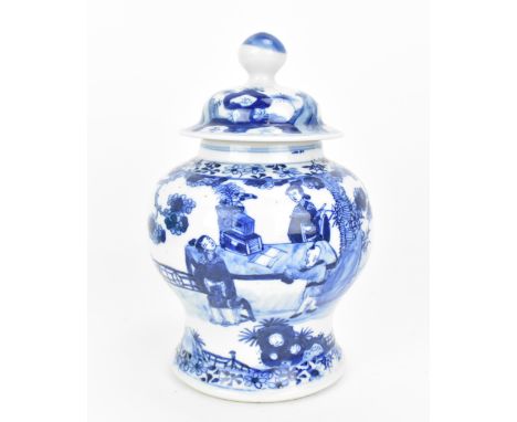 A Chinese blue and white porcelain lidded minyao vase, 18th century, Kangxi period (1662-1722), of baluster form, designed wi