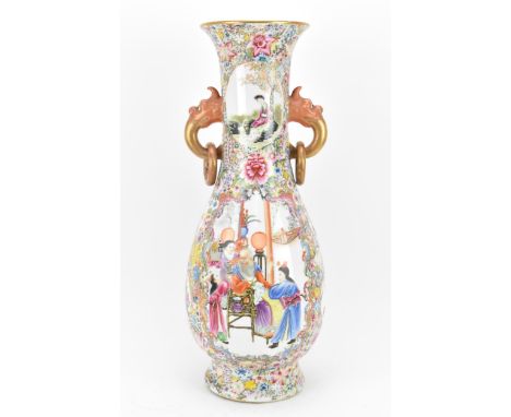 A large Chinese Famille Rose baluster vase, Republic Period, decorated to the body with central figural scenes and smaller na