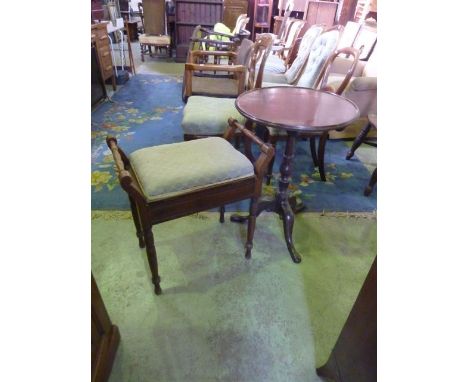 A Georgian mahogany snap top occasional table, the circular tray top raised on a central turned column and shaped tripod toge