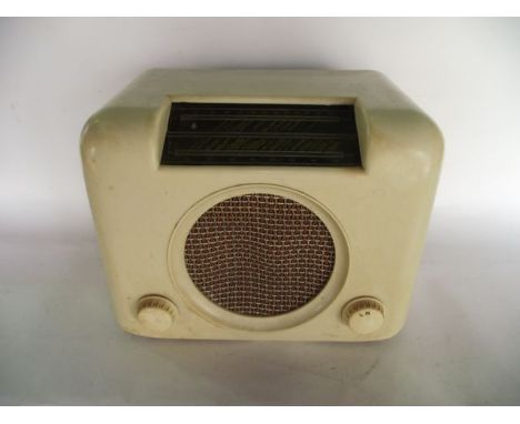 A vintage cream Bakelite cased Bush radio type DAC 90, 22 cm tall x 30 cm wide approx