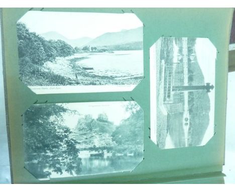 Four vintage postcard albums containing a selection of continental, British and other topographical cards, etc