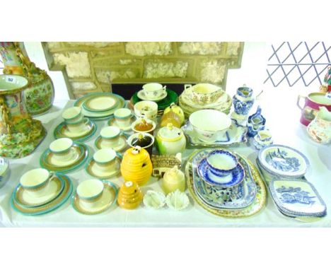 A quantity ceramics including a blue and white printed pint jug with decoration including a royal coat of arms, figures readi
