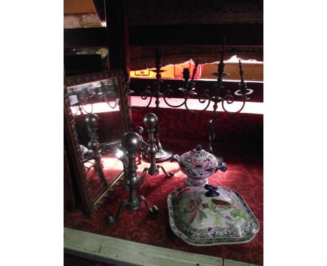 A pair of metalwork fire dogs, a pair of antique gas burning three divisional candelabra on scrolling supports, an Ironstone 