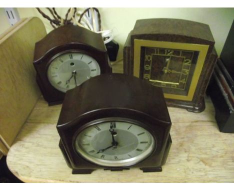 Three mid-19th century electric mantel clocks, all three in bakelite cases, all marked Smiths Sectric