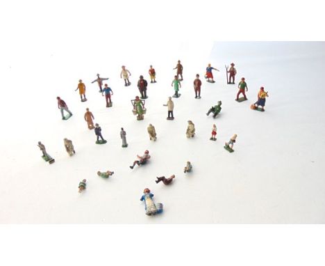 A collection of approximately thirty vintage painted lead figures, all farm related, to include farmer, field workers, milkma