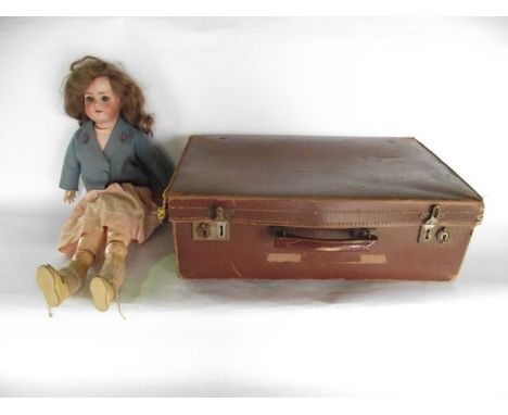 A good quality early 20th century bisque headed German doll by Simon & Halbig with closing eyes and painted facial detail, th