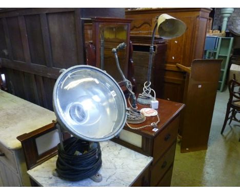 Two vintage industrial table lamps with partially coiled sprung adjustable stems, together with a further vintage search/spot