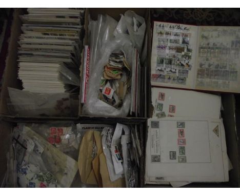 Four boxes of stamps including stamped first day issues, several bags of loose stamps (unsorted), worldwide 