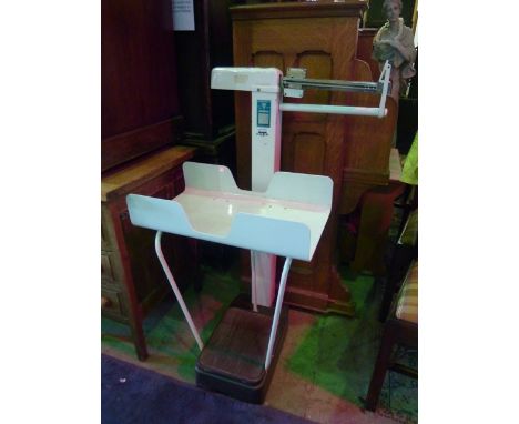A set of floorstanding baby/person scales to weigh 150 kg