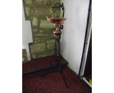 A good quality 19th century copper kettle with brass and turned timber looping handle together with an associated lidded burn
