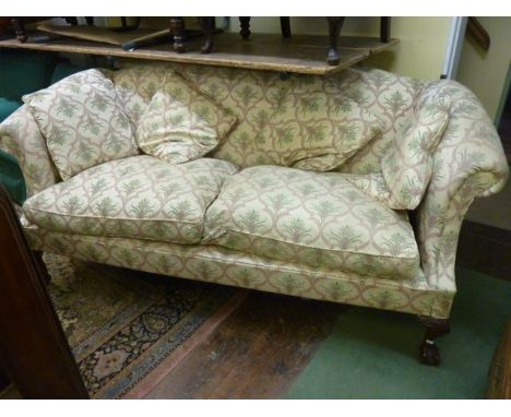 A good quality Wesley Barrel three seat sofa in a Georgian style with feather filled upholstery, the cream ground upholstery 