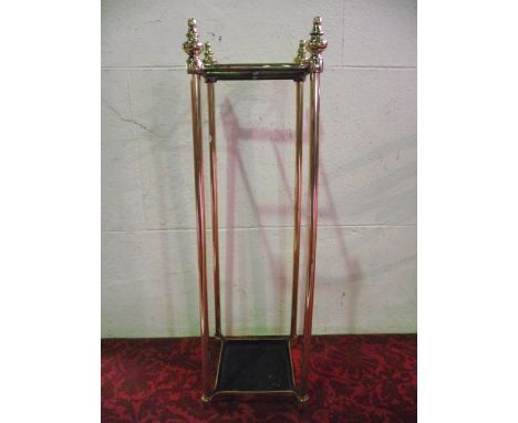 A good quality polished brass four divisional umbrella/stick stand of simple squared form