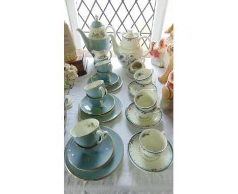 A six place Royal Doulton Rose Elegans coffee service comprising coffee pot, milk jug, sugar bowl, six cups, six saucers and 