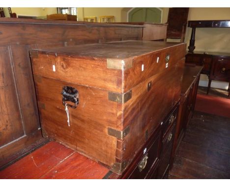 A camphor wood travelling trunk of rectangular form with flush fitting brass mounts and two locks, 89cm maximum