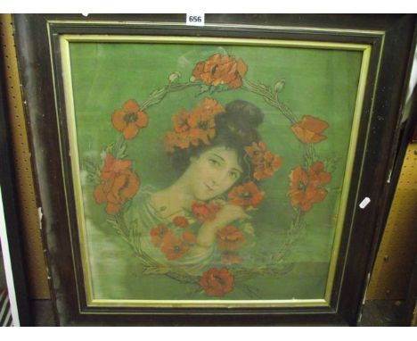 An early 20th century coloured print on fabric of an Art Nouveau style female character holding poppies and surrounded by a g