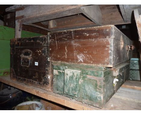 A vintage stained pine and steel banded chest with hinged lid and twin lock, together with two further boxes of varying desig