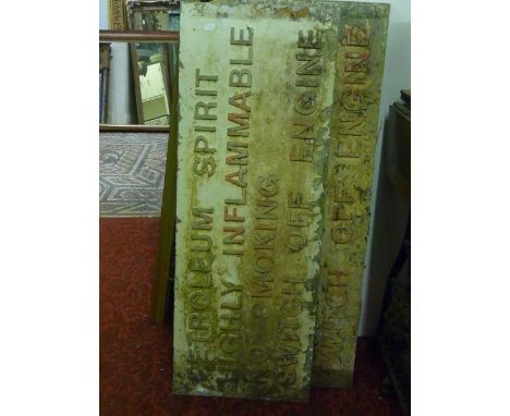 Four reclaimed/weathered cast aluminium signs of rectangular form with raised lettering petroleum, spirit, highly inflammable