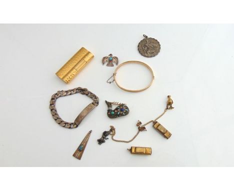 A sterling silver identity bracelet; a sterling silver St. Christopher pendant, the reverse with car and plane details; a whi